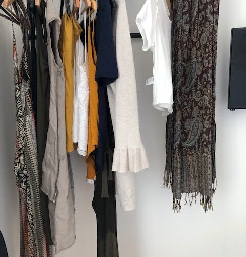 clothes hanging on rack