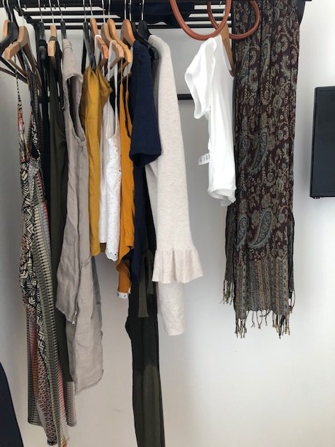 clothes hanging on rack